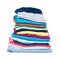 Stack of clothes, fresh laundry textile. Isolated