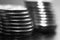 Stack of coins black and white macro