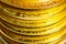 Stack of coins , closeup view of coins edges with selective focus for finance and business concept