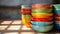 A stack of colorful bowls sitting on top of each other, AI