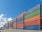 Stack of colorful container cargo ship in the export and import business and logistics international goods in urban city. Shipping