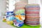 Stack of colorful hand painted ceramic bowls and plates