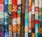 Stack of colorful quilting batik fabrics as a vibrant background image