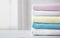 Stack of colorful terry towels empty space design. Colorful laundry.Household
