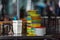Stack of colourful dishes on stainless steel table