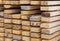 Stack of coniferous boards, building materials pattern a natural base