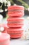 Stack of coral cakes macarons or macaroons