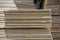 stack of corrugated cardboard boxes. egde view of flattened boxes.