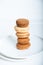 Stack of delicious freshly baked macaron confections.