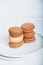 Stack of delicious freshly baked macaron confections.