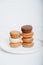 Stack of delicious freshly baked macaron confections.