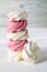 Stack of delicious homemade white and pink marshmallows of different flavors