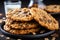 Stack of Delicious Oatmeal Cookies and Milk on Rustic Wooden Table with Copy Space