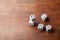 Stack of dice on rustic wooden table. Gambling devices. Game of chance concept. Copy space for text.