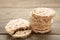 A stack of dietary round, airy, crisp buckwheat crispbread on grey wooden background