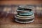 Stack of different ancient copper coins with patina