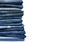 Stack of different blue jeans