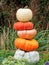 Stack of different colored pumpkins