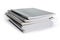 Stack of the different exercise books on a white background