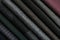 Stack of different fabric samples as background. Textile texture