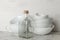 A stack of dishes. tableware on a light concrete background. dishes for serving the table. bowls and cups