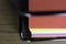 Stack of documents on brightly colored paper on stacked tray on office table