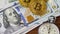 Stack of dollar banknotes, Bitcoin BTC and silver metal stopwatch