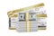 Stack of Dollar Bills in front of Two Golden Business or First Class Airline Boarding Pass Fly Air Tickets. 3d Rendering