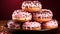 A stack of doughnuts with chocolate pink color background