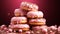 A stack of doughnuts with chocolate pink color background