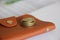 Stack of euro coins put on brown leather wallet. Selective focus. Money earning and saving concept