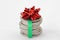 Stack of euro coins wrapped with ribbon and gift bow - Concept of economy and money gift