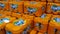 Stack of Fanta six pack Orange fizzy drink cans