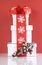 Stack of festive red and white theme Christmas gift boxes