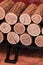 Stack of firewood sawn clean clean close up cracked rings background