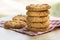 Stack of five Anzac biscuits.