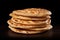 A stack of flat bread sitting on top of a wooden table, freshly baked naan bread.