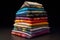 stack of folded handcrafted quilts