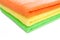 Stack of fresh colorful towels isolated