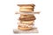 Stack of fresh rye crispbreads, crunchy rice cakes and rusks on white background