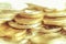 Stack of golden coins macro. Rows of coins for finance and banking concept. Economy trends background for business idea.