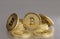 Stack of golden coins on metal floor as example for virtual crypto currency, bitcoin and blockchain technology