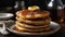 A stack of golden pancakes with a drizzle of syrup and a pat of butter created with Generative AI