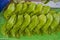 Stack of green fresh betel leaf in asia market, India