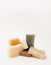 Stack of handmade organic soap on white background