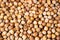 Stack of hazelnuts. Hazelnut background.