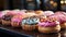 Stack of homemade donuts with colorful icing and strawberry decoration generated by AI