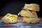 Stack of homemade nest-shaped pasta on wooden table