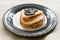 Stack of homemade shrovetide carnival pancakes on blue plate on rustic country table. Soft focus. Copy space. Pancake carnival