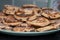 Stack of Homemade Welsh Cakes Bakestones freshly cooked on a green plate